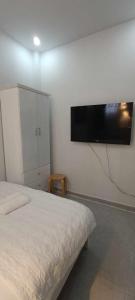 Televiisor ja/või meelelahutuskeskus majutusasutuses Vy Khanh Guesthouse