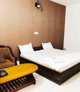En eller flere senge i et værelse på THE GARDEN -- By SKY Group -- Special for Families, Couples, Corporate, Groups