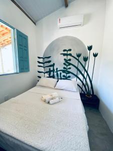 Ліжко або ліжка в номері Casa das Artes