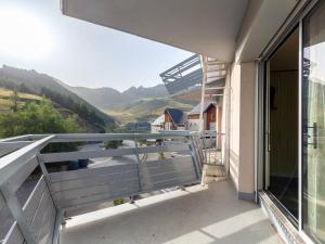 a balcony with a view of the mountains at Studio Peyragudes, 1 pièce, 4 personnes - FR-1-695-39 in Germ