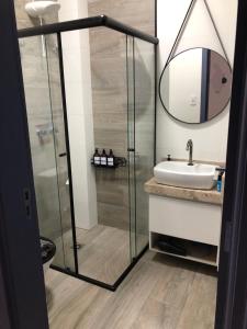 Vannituba majutusasutuses Uai House com jacuzzi (Espaço romântico)
