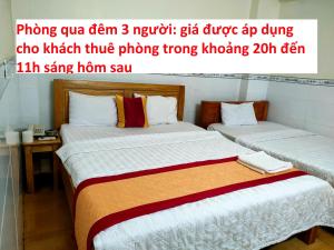 Giường trong phòng chung tại Hoàng Xuân 797 Hà Huy Giáp