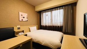 TV a/nebo společenská místnost v ubytování ​Hotel Route-Inn Kumagaya​