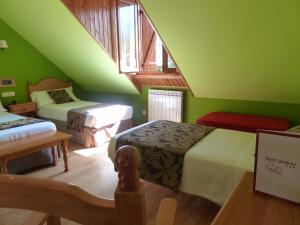 Postel nebo postele na pokoji v ubytování Hotel Sabocos