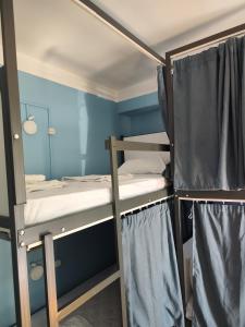 Letto o letti in una camera di Sweet Sleep hostel