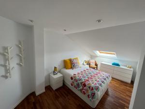 Postel nebo postele na pokoji v ubytování DUPLEX URB SANTA MARTA
