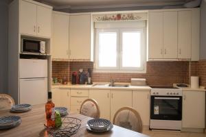 A kitchen or kitchenette at Utopicon