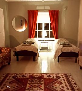 Llit o llits en una habitació de Residenssi Tuuli