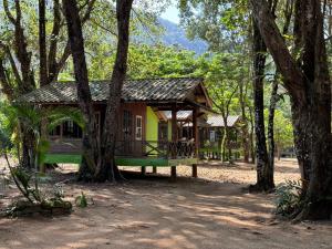 a small house in the middle of a forest at Changthong Bungalow in Koh Chang Ranong