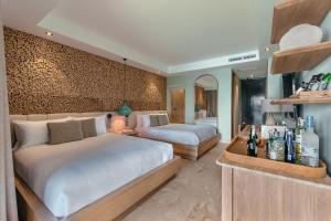 Letto o letti in una camera di The Brown, Guatape, Autograph Collection