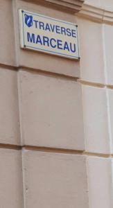 a street sign on the side of a building at Cœur de Cannes in Cannes