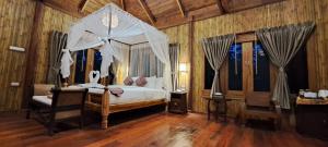 Cama ou camas em um quarto em Viking Nature Resort