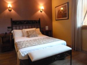 Postel nebo postele na pokoji v ubytování Hotel Sabocos