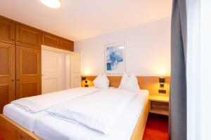 Posteľ alebo postele v izbe v ubytovaní Chalet Georg