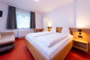 Posteľ alebo postele v izbe v ubytovaní Chalet Georg