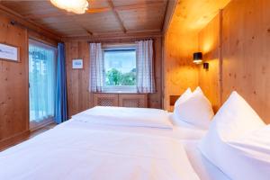 Posteľ alebo postele v izbe v ubytovaní Chalet Georg