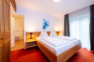 Posteľ alebo postele v izbe v ubytovaní Chalet Georg