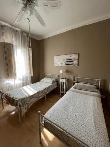 Postel nebo postele na pokoji v ubytování B&B " La Casetta "