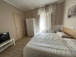 Postel nebo postele na pokoji v ubytování B&B " La Casetta "