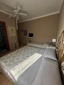 Postel nebo postele na pokoji v ubytování B&B " La Casetta "