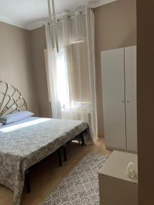 Postel nebo postele na pokoji v ubytování B&B " La Casetta "