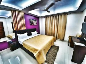 Postel nebo postele na pokoji v ubytování Hotel Delhi Aerocity, NH 48