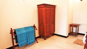 Postel nebo postele na pokoji v ubytování Tropical Inn