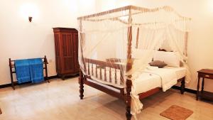 Postel nebo postele na pokoji v ubytování Tropical Inn