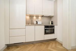 Kuchyň nebo kuchyňský kout v ubytování Milosrdnych Apartments