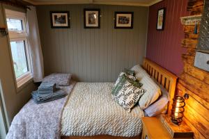 a bedroom with a bed in a room at The Drivers Rest a Shepherds in beautiful surroundings in Oakmere Cheshire in Delamere