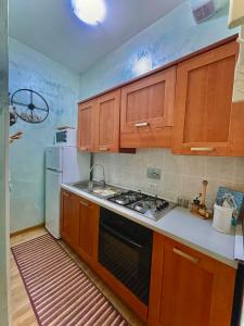 Kuchyň nebo kuchyňský kout v ubytování Francesca Apartments Ostia