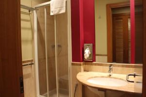 Koupelna v ubytování Club Hotel