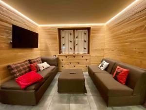 Posezení v ubytování La petite maison d'Erika