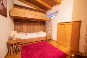 Postel nebo postele na pokoji v ubytování All Seasons Lodge by All in One Apartments
