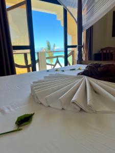 Postel nebo postele na pokoji v ubytování Mahali Zanzibar