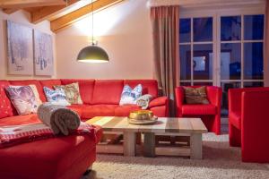 Posezení v ubytování All Seasons Lodge by All in One Apartments