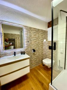 Vannituba majutusasutuses Wellness Hotel Florián České Žleby