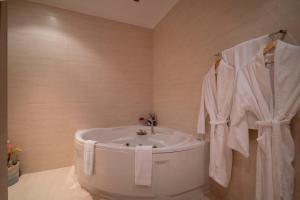 Koupelna v ubytování Hotel Onix