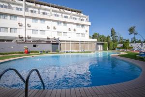 Bazén v ubytování Hotel Onix nebo v jeho okolí