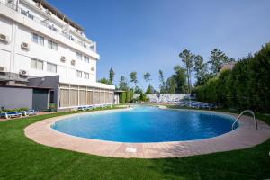 Bazén v ubytování Hotel Onix nebo v jeho okolí