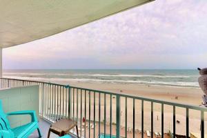a balcony with a view of the beach at Daytona Beach Club 708 in Daytona Beach