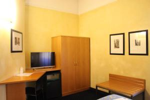 TV a/nebo společenská místnost v ubytování Club Hotel