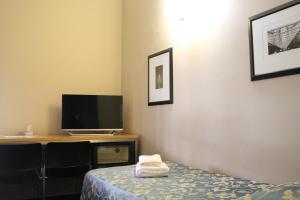 TV a/nebo společenská místnost v ubytování Club Hotel