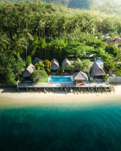 an aerial view of a resort on a beach at Krisna Bungalows and Restaurant in Sekotong