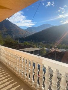 a balcony with a view of the mountains at Apartman Bilanovic in Konjic