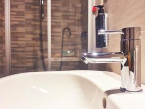 Ванная комната в Hotel Florida Lerici