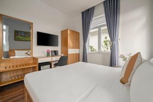 Myrtle Boutique Hotel TV 또는 엔터테인먼트 센터