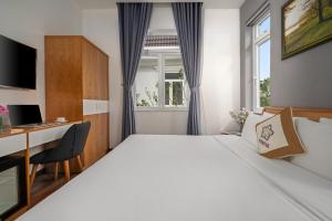 Myrtle Boutique Hotel 객실 침대