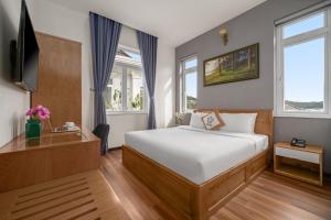 Myrtle Boutique Hotel 객실 침대