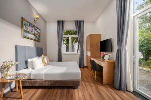 Myrtle Boutique Hotel 객실 침대